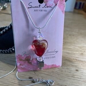Red glass heart & crystal & metallic beads on a silver plated necklace